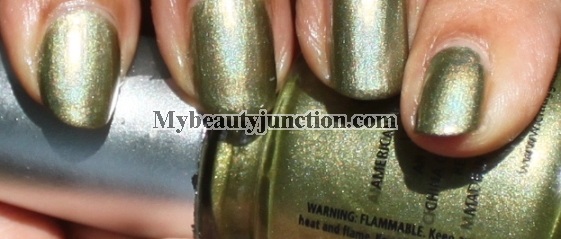 St Patrick's Day green shamrock nail art with China Glaze OMG It's A UFO polish and O.P.I. Greenwich Village