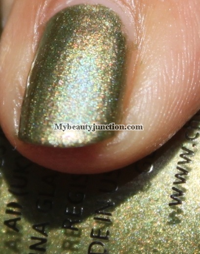 St Patrick's Day green shamrock nail art with China Glaze OMG It's A UFO polish and O.P.I. Greenwich Village