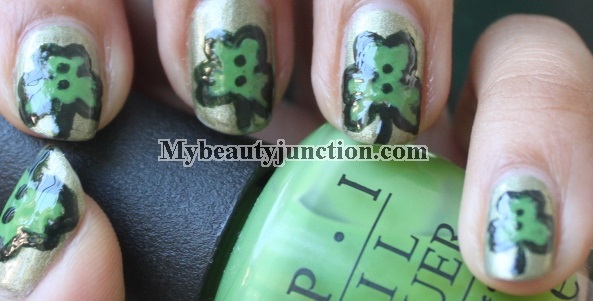 St Patrick's Day green shamrock nail art with China Glaze OMG It's A UFO polish and O.P.I. Greenwich Village